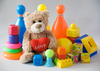 Creative plastic toys and teddy bear