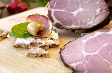 Sandwiches with gammon, greens and olive