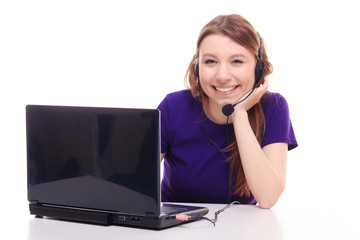 Pretty girl works at the computer