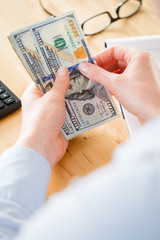 Businesswoman Counting Money