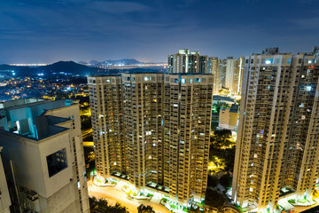 Fototapeta na wymiar Hong Kong residential building at night