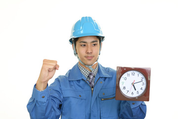 ガッツポーズの作業員