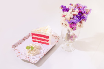 Strawberry cake and flower on table (Vintage process tone)