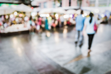 Blurred people walking in the shopping center