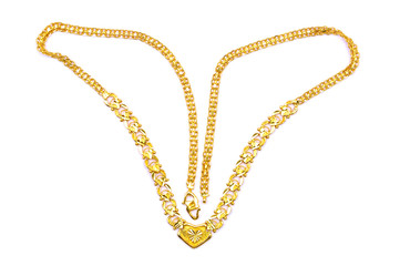 Gold necklace over white background