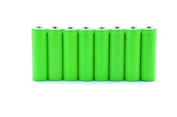 Green Cylinder Size AA Batteries Over White Background
