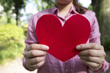 Young women who have a red heart