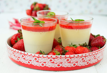 Vanilla panna cotta with berry sauce
