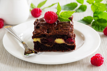 Chocolate brownie with raspberries and mascarpone.