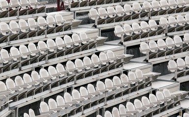 many empty seats in the stands before the sporting event