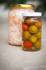 Jars of organic pickled vegetables. Marinated food. Clean eating concept