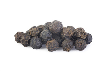 Black pepper seeds on white