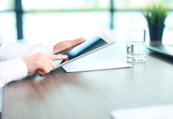 Fototapeta premium Businesswoman hands with touchpad