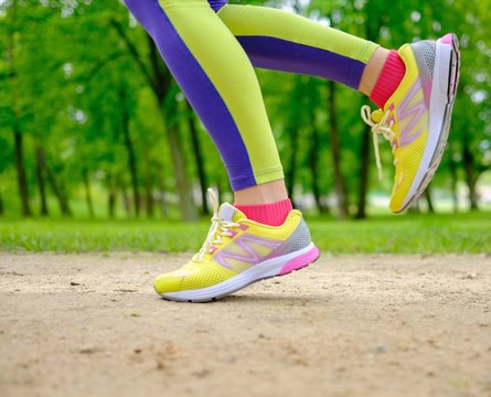 Runner Running Outdoors Wearing Leggings