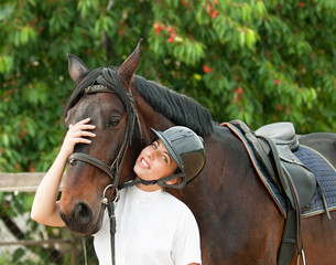 Woman rider and horse