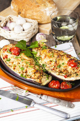 Aubergine stuffed with vegetables and cheese