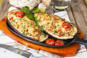 Aubergine stuffed with vegetables and cheese