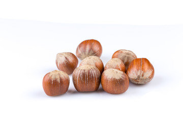 Hazelnuts on white