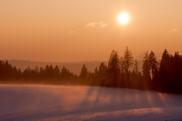 Sunset in winter landscape.