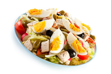 Boiled eggs with roast chicken fillet and vegetables 