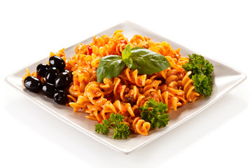 Pasta with meat, tomato sauce and vegetables on white background 