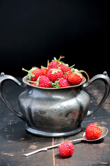 Strawberries in vintage sugar bowl
