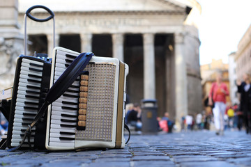 Accordion and harmonica in the background of  Pantheon in Rome