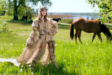 Ancient Medieval woman in costume from gunny sacking