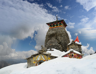 Tungnath Shiva temple on a clouds background
