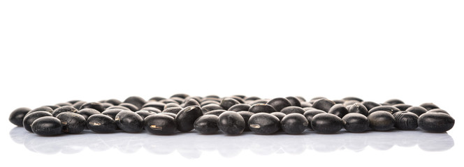 Black beans over white background