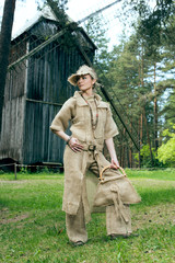 Ancient Medieval woman in costume from gunny sacking