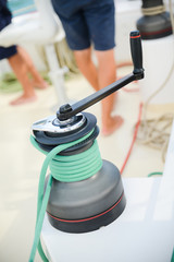 Obraz premium winch rope cleat details of sail boat at sea
