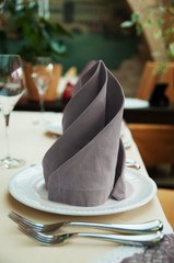 gray napkin on table in restaurant