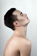 Perspiring male model in profile