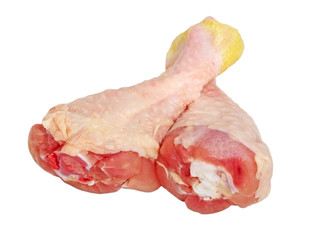 Two uncooked chicken legs.