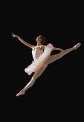Fototapeta premium Ballerina in jump isolated onblack