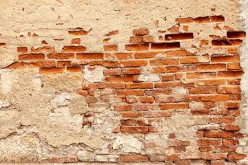 Old crumbling brick wall