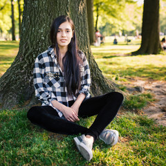 Young woman relaxing in Central Park. New York City.