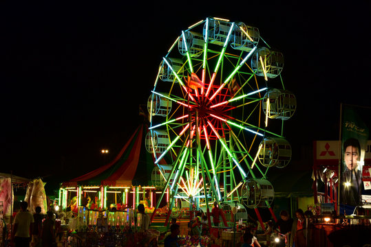 Amusement in  night  Where people are having fun and happiness 