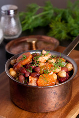 chili with beans, peas and chicken, close up