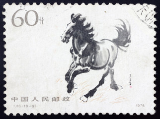 CHINA - CIRCA 1978: A stamp printed running horse, circa 1978. This traditional Chinese painting was painting by outstanding paintings masters Xu Beihong.