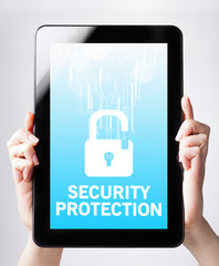 A girl holding a tablet pc with text security. Business, technol