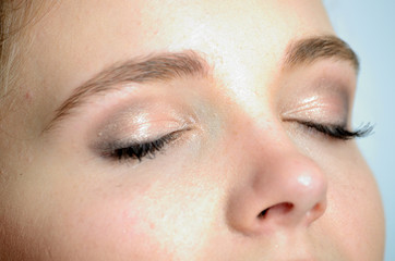 Obraz premium Closed eyes close-up photo
