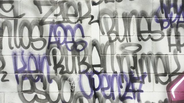 Graffiti en un muro de una calle de Barcelona