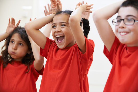 Group Of Children Enjoying Drama Class Together