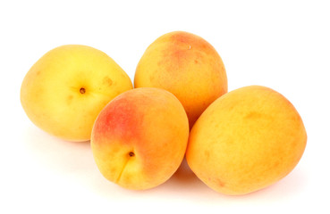 yellow plums on a white background