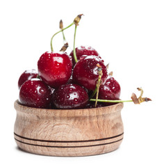 cherries in wooden bowl