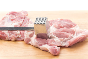 Meat Tenderizer on wooden board. isolated on white background