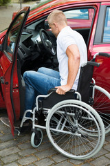 Obraz premium Handicapped Man Boarding In His Car