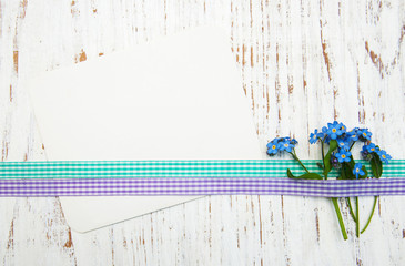 Forget-me-nots flowers with card